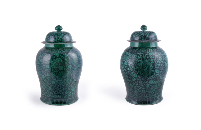 An attractive large pair of Chinese Famille Noire 'Temple' vases and covers 19th century