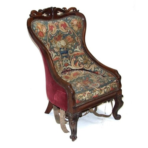 An early 19th century rosewood chair with needlework tapestr...