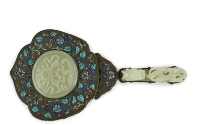 An early 20th century Chinese enamelled copper hand mirror w...