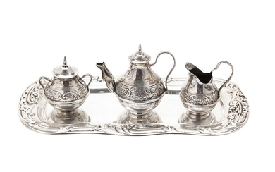 An early to mid 20th century Dutch 833 standard silver miniature novelty three piece tea service