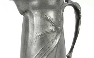 Art nouveau pewter jug with li