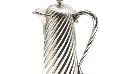 Austro-Hungarian silver wine jug with twisted body and handle, gilt inside. Weight...