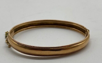 Bracelet rigide ouvert en or jaune 18K (750) Poids : 14.62g