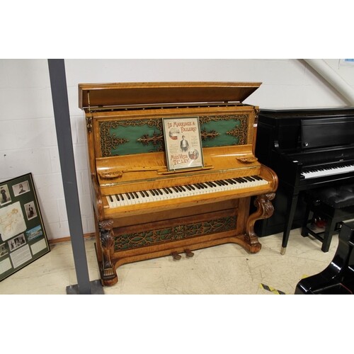 Brinsmead (c1855) An upright piano in a birch case with carv...