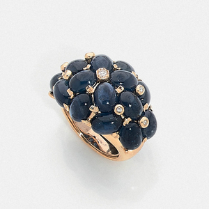 CABOCHON SAPPHIRE RING A sapphire, diamond and gold...