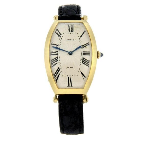 CARTIER - a Tonneau wrist watch. Yellow metal case, stamped 750. Case width 26mm. Reference 007-90