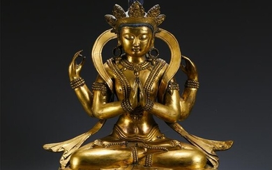 CHINESE GILT BRONZE FOUR ARM SEATED GUANYIN WITH LOTUS