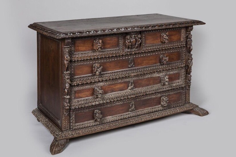 COMMODE called "A BAMBOCCI" in walnut moulded and carved and burr walnut. The rectangular shaped top decorated with gadroons on the edge, the chest of drawers opening by six drawers on four rows. The console uprights are decorated with naked figures...