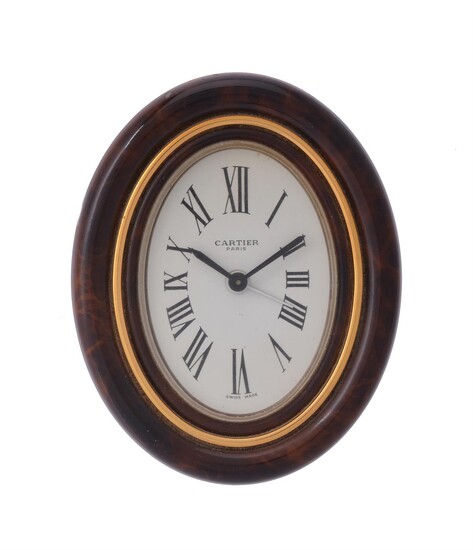 Cartier, a gilt metal and brown lacquer desk alarm clock
