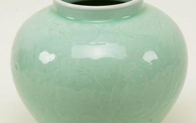 Celadon porcelain jar. China. 19th century. Decorated