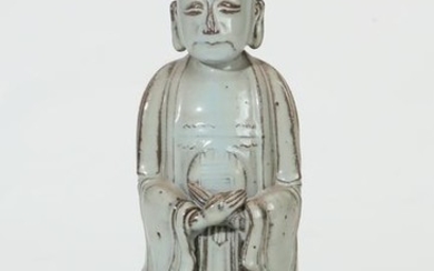Chinese celadon glazed model of a standing figure
