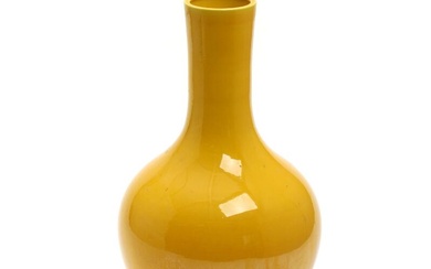 Chinese porcelain bottle vase, decorated in monochrome yellow glaze. Republic 1912–1949. H....
