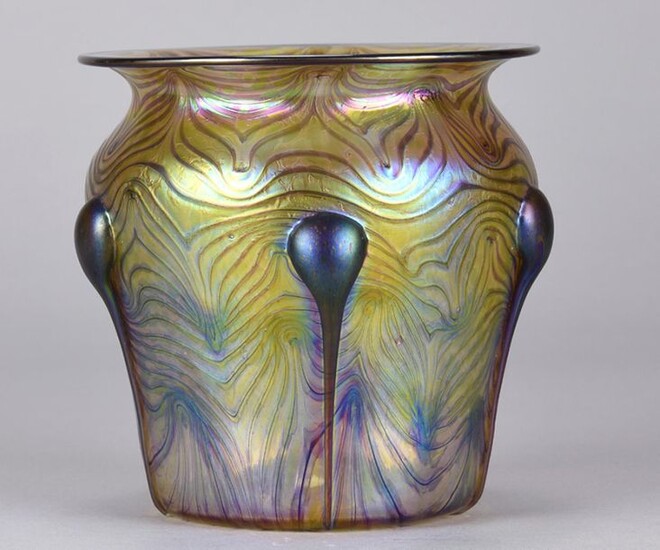Czech Glass (late 20th Century) Iridescent pink, purple and yellow glass vase deocrated with raised roundel in the shape of tear drops against a feathered background . Circa 1970. Height 13 cm High.