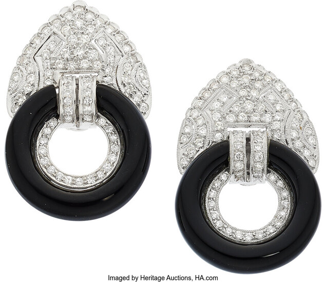Diamond, Black Onyx, White Gold Earrings Stones: Full-cut diamonds...