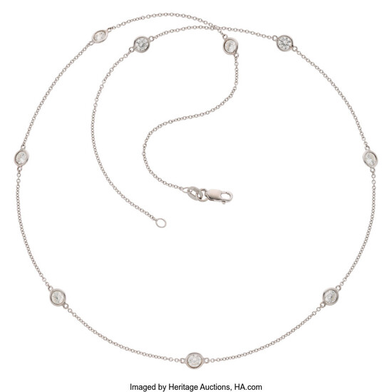 Diamond, White Gold Necklace The necklace features full-cut diamonds...
