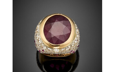 Diamond in all ct. 4.70 circa and ruby in all ct. 0.80 circa bi-coloured gold ring centering a big oval...