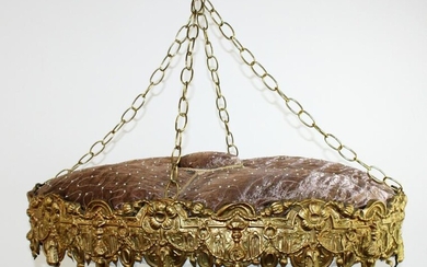 Embossed brass oval upholstered bed canopy