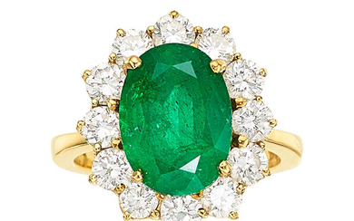 Emerald, Diamond, Gold Ring The ring features an oval-shaped...