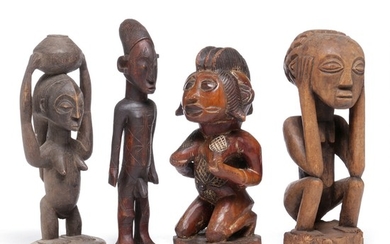 Four ancestor figures of carved patinated wood. Mangbetu and Luba style. H. 34–39 cm. (4)