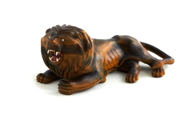 Georg O. Wild carved tiger's-eye lion