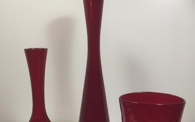 NOT SOLD. Gunnar Ander a.o.: Three vases of red glass. Made by Elme Glasbruk and one from Reilmyre. 1950s-1960s. H. 15 - 35 cm. (3) – Bruun Rasmussen Auctioneers of Fine Art