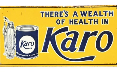 KARO SYRUP EMBOSSED TIN SIGN W/ CAN GRAPHIC.
