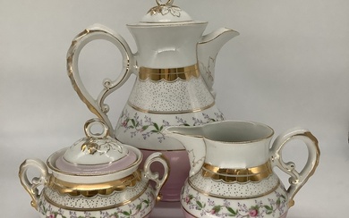 Kuznetsov coffee service. Late 19th century. Hand-painted and gold edging. Good preservation. Large coffee pot, milk jug and sugar bowl in good condition, no chips or cracks. Rare items from the times of the Russian Empire