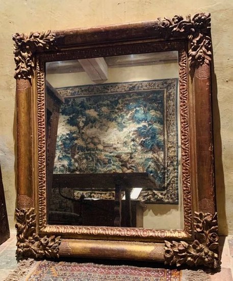 MIRROR made of gilded and carved wood, rectangular...