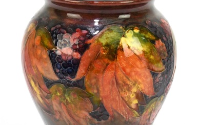 MOORCROFT; a 'Leaf and Berry' pattern flambe vase, impressed marks...