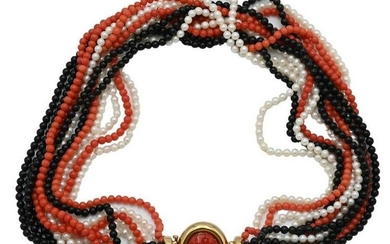 Oggi 18 Karat Gold 12 Strand Necklace, having 4 coral