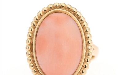 SOLD. Ole Lynggaard: A coral ring set with a cabochon coral, mounted in 14k gold....