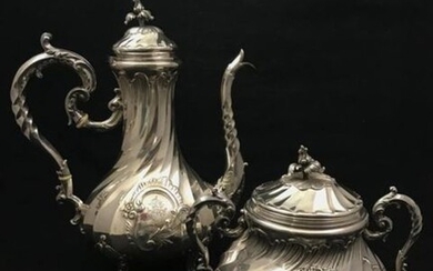 Part of a coffee service comprising a sugar bowl and...
