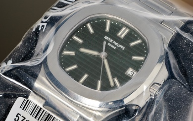 Patek Philippe, Ref. 5711/1A-014 A factory sealed, extremely scarce, and highly coveted stainless steel wristwatch with date, olive green dial, Certificate of Origin, and presentation box