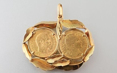 Pendant in yellow gold 750 thousandths: leaves holding two 10 franc coins of 1858 and 1911, French work of the 60s.