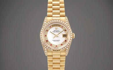 Rolex Day-Date, Reference 18388 | A yellow gold, diamond and ruby-set wristwatch with day, date, mother-of-pearl dial and bracelet, Circa 1988 | 勞力士 | Day-Date 型號18388 | 黃金鑲鑽石及紅寶石鏈帶腕錶，備日期、星期顯示及珠母貝錶盤，約1988年製
