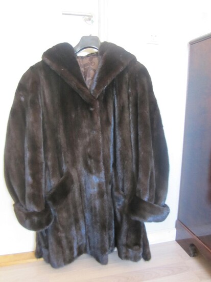 SOLD. Sagamink: Mink fur with hood and side pockets. Size Large. L. 85 cm. – Bruun Rasmussen Auctioneers of Fine Art