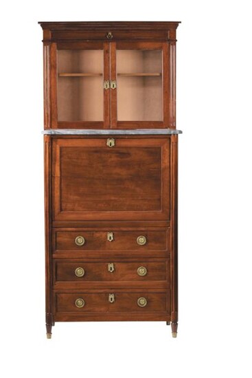 Guillotine secretary forming a showcase at the top in mahogany and mahogany veneer moulding. One small drawer, 2 glass doors, a flap and 3 large drawers. Sainte Anne marble top. Small tapered legs.