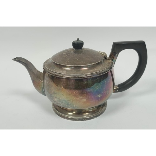 Silver tea pot of plain compressed spherical shape by Reid &...