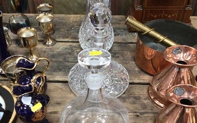 Stuart cut glass carafe, Edinburgh Crystal cut glass jug, Waterford cut glass ships decanter, two other decanters and a cut glass rose bowl