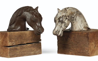 TWO CAST IRON HORSE HEADS, POSSIBLY AMERICAN, LATE 19TH CENTURY