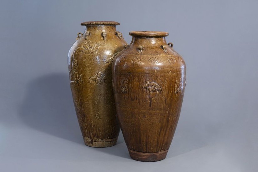 Two large monochrome brown glazed martaban jars, South...