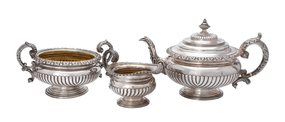 Y A George IV silver three piece circular tea set by S. C. Younge & Co.