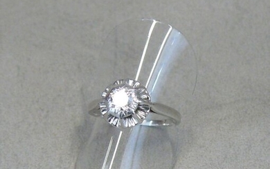 A solitaire ring in white gold (owl), set with a...