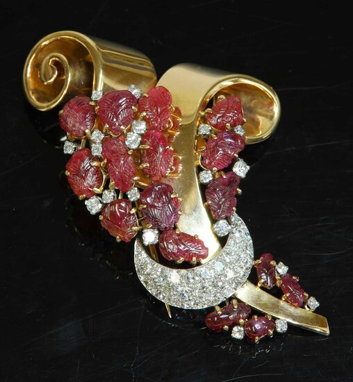 A rose gold and platinum carved ruby and diamond set clip brooch, c.1940