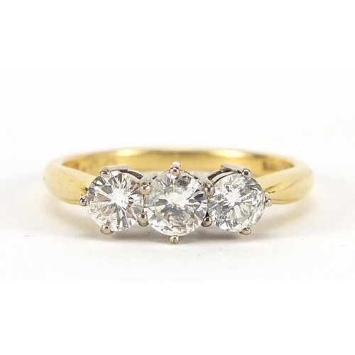 18ct gold diamond three stone ring, the central diamond appr...