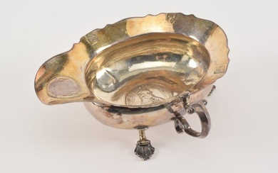 18th century continental German(?) 1770 silver sauce boat. 2 silver coin decorations. Shell feet.