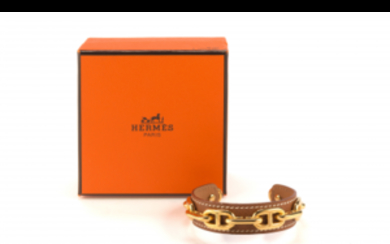 HERMES Hazelnut leather with applied gilt-metal chain cuff bracelet,...