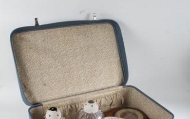 1960's blue suitcase, containing an Art Deco mantel clock, a pair of frilled glass light shades