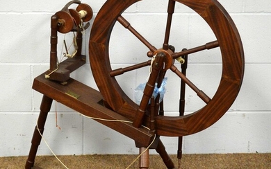 20th C mahogany spinning wheel.
