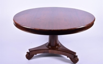A 19th century rosewood tilt-top breakfast table with plain frieze over an inverted tapering support to a platform tripod...